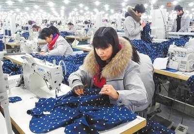 郭梅花 让留守妇女家门口就业的服装加工匠人